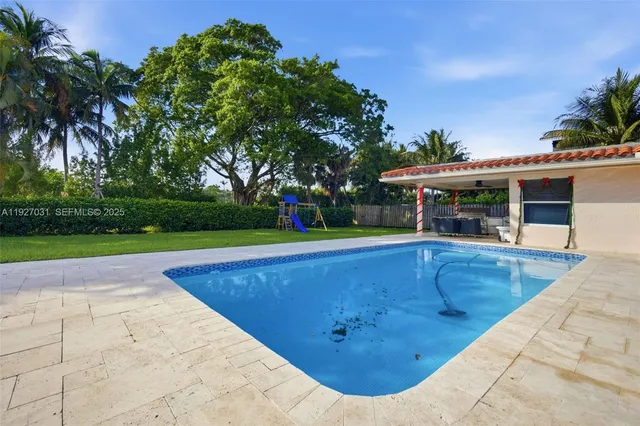 a view of outdoor space yard swimming pool and patio