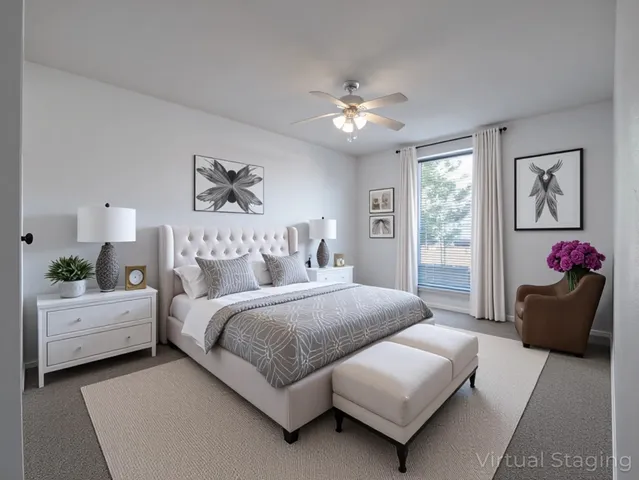 a spacious bedroom with a bed and a couch