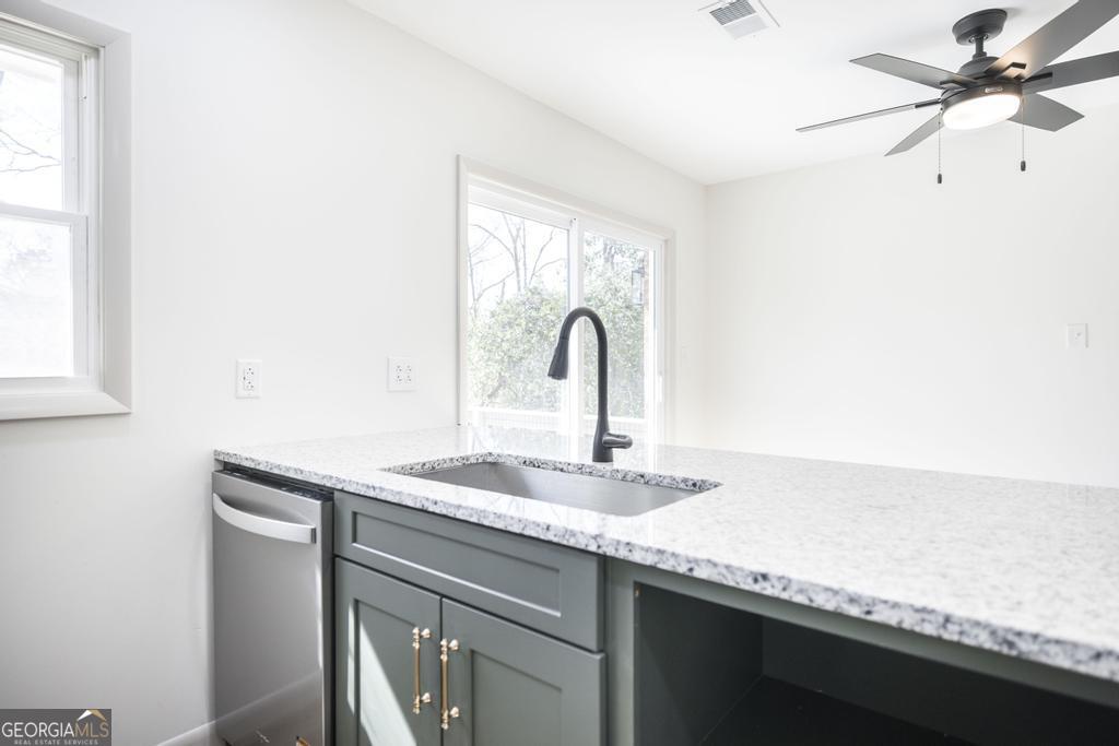 103 Spring Street Warner Robins, GA 31088 - Photo 14 of 30 a close view of sink and tap