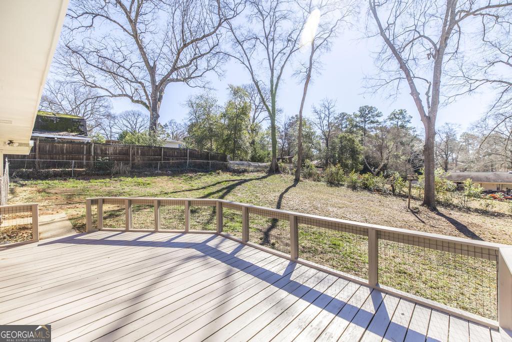 103 Spring Street Warner Robins, GA 31088 - Photo 26 of 30 a view of a swimming pool with seating space