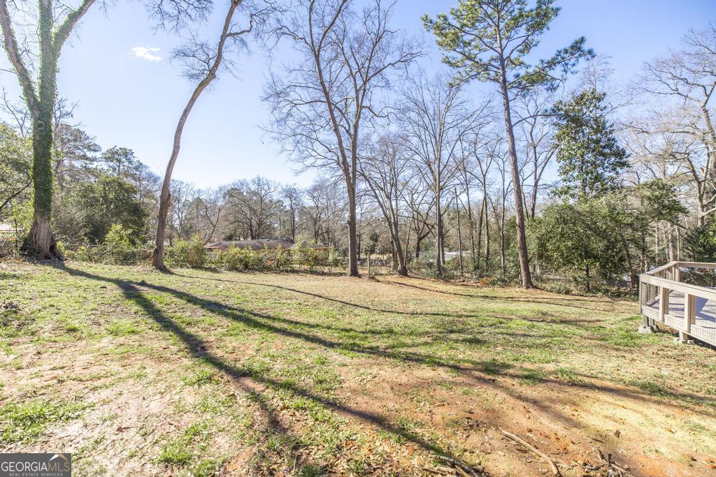 103 Spring Street Warner Robins, GA 31088 - Photo 30 of 30 a view of yard with tree s