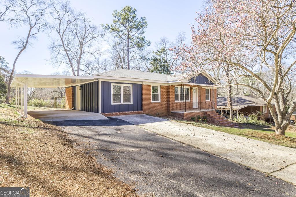 103 Spring Street Warner Robins, GA 31088 - Photo 5 of 30 a view of a yard in front of a house