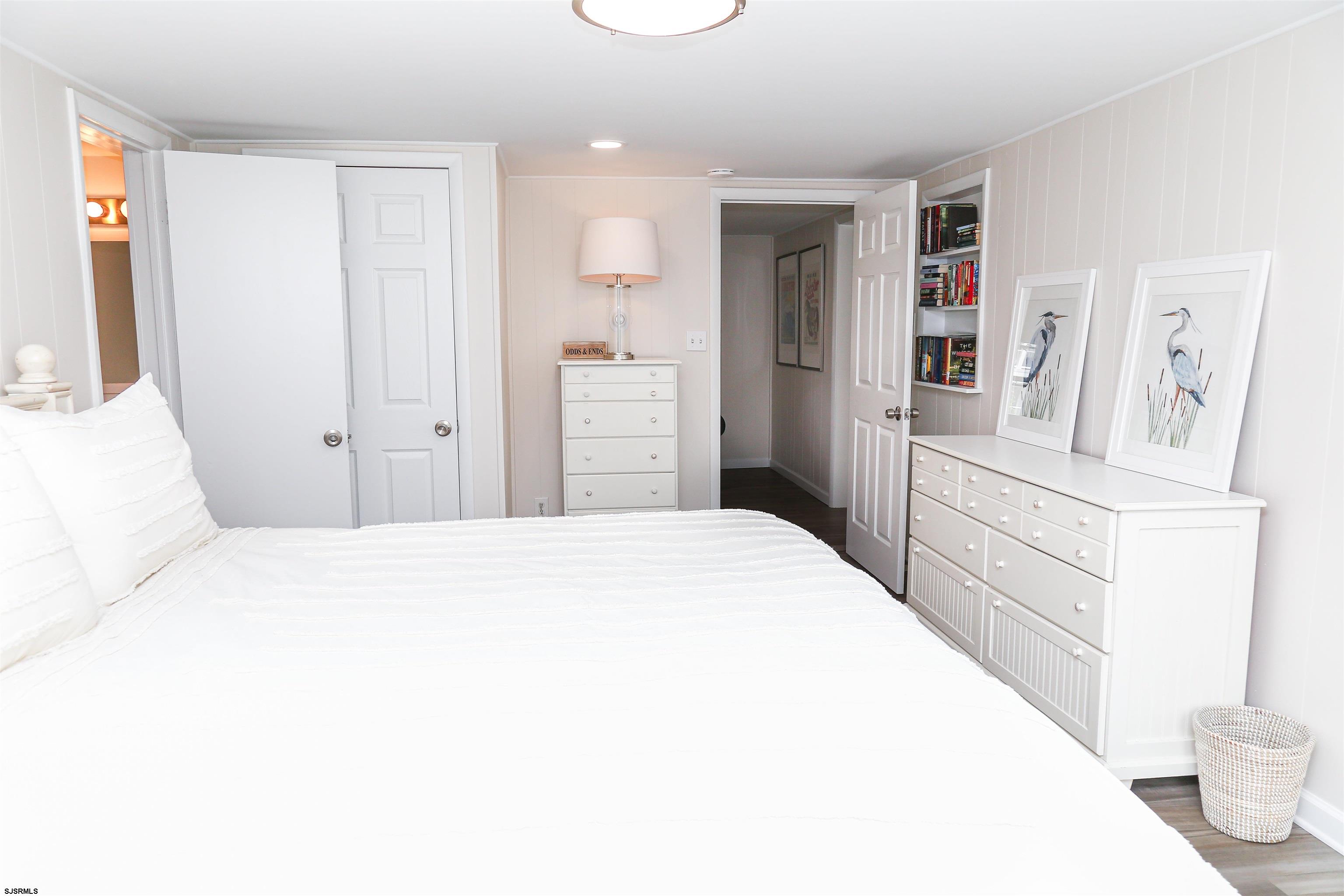 307 28th Street South Brigantine, NJ 08203 - Photo 23 of 38 a bedroom with a bed and a cabinets