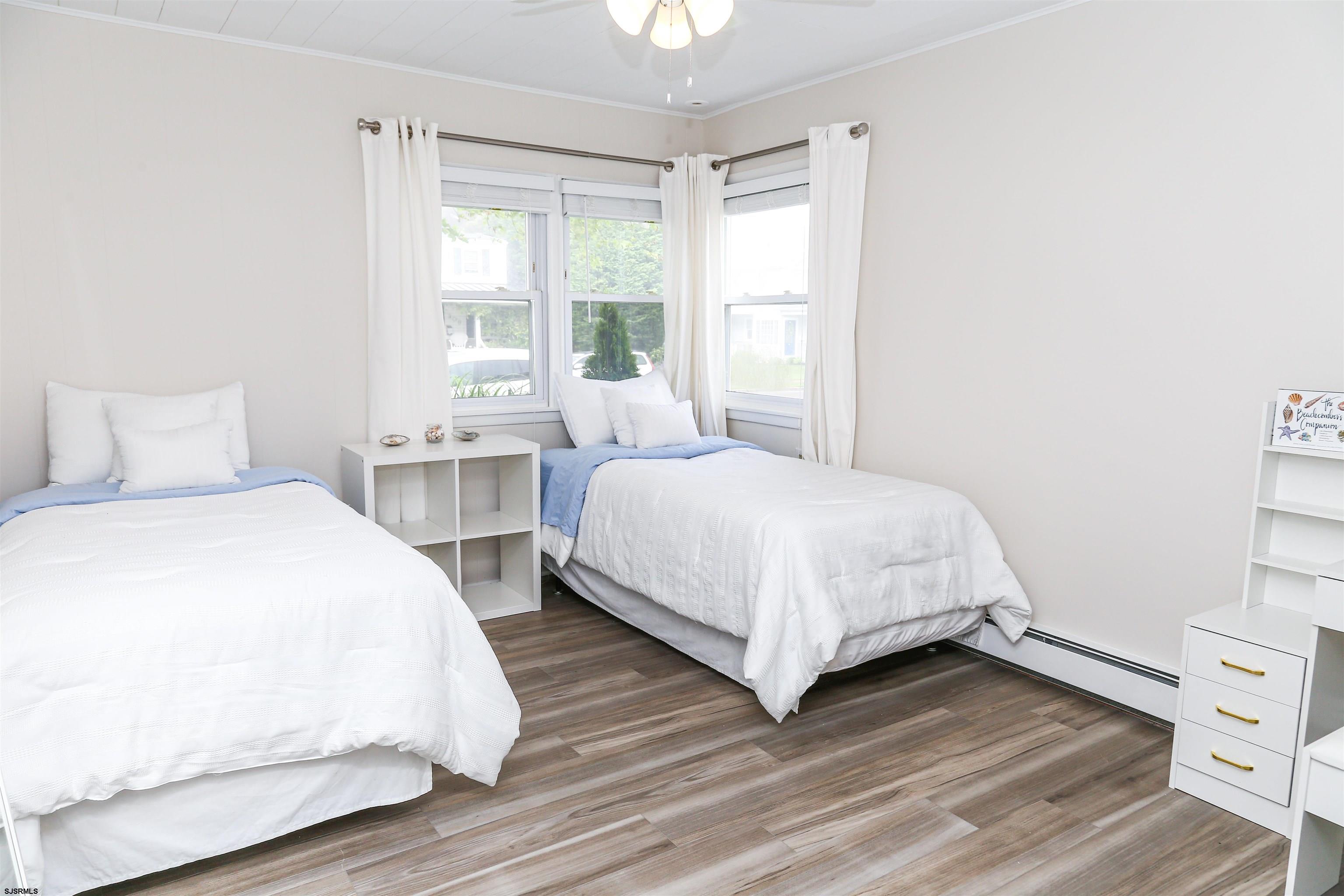 307 28th Street South Brigantine, NJ 08203 - Photo 28 of 38 a bedroom with a bed and a window