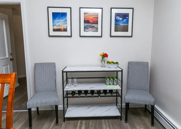 a living room with furniture and a chair