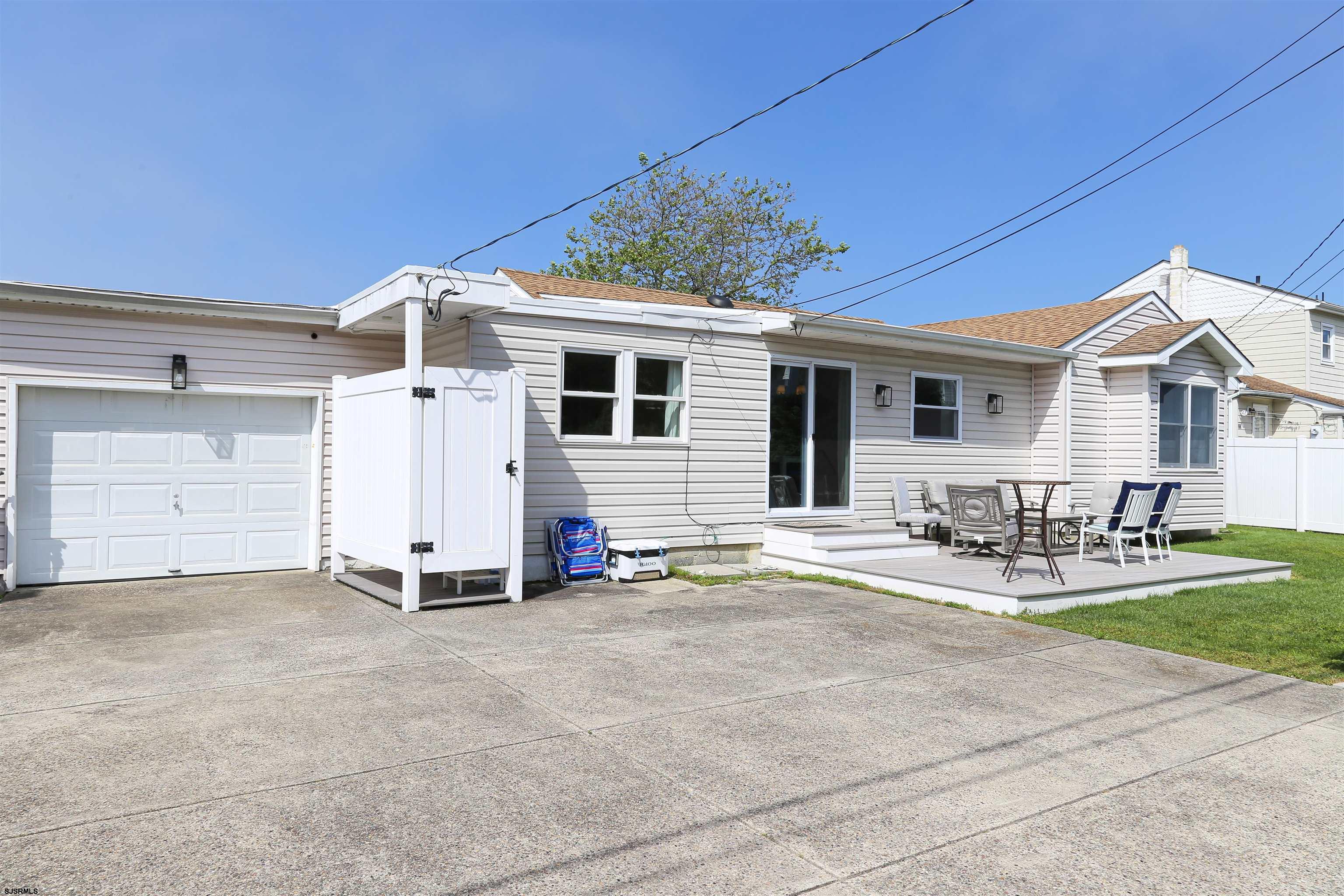 307 28th Street South Brigantine, NJ 08203 - Photo 34 of 38 a view of a house with backyard and porch