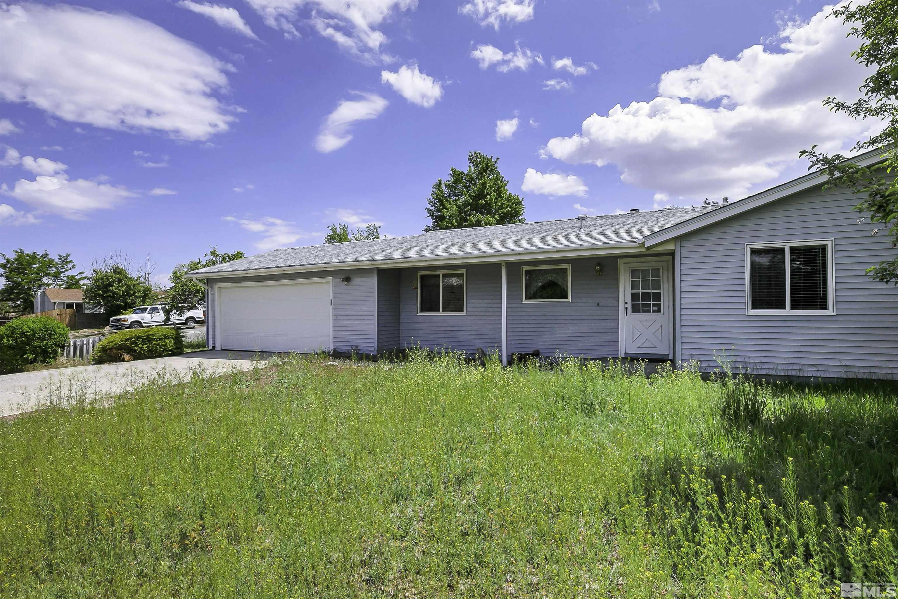 14075 Tourmaline Drive Reno, NV 89521 - Photo 29 of 37 a view of a house with backyard