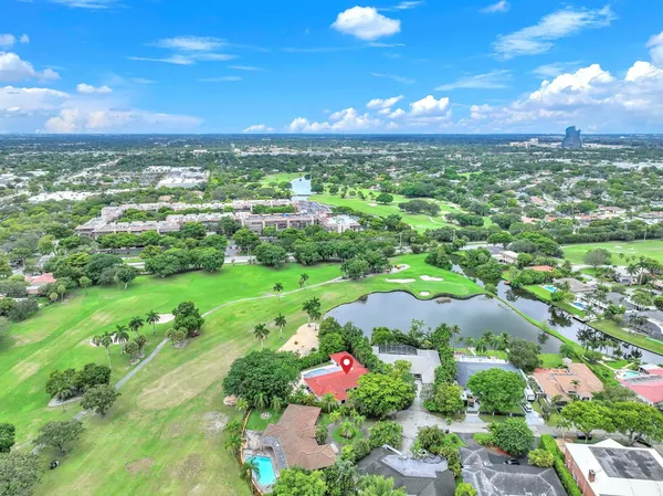 a view of city and green space