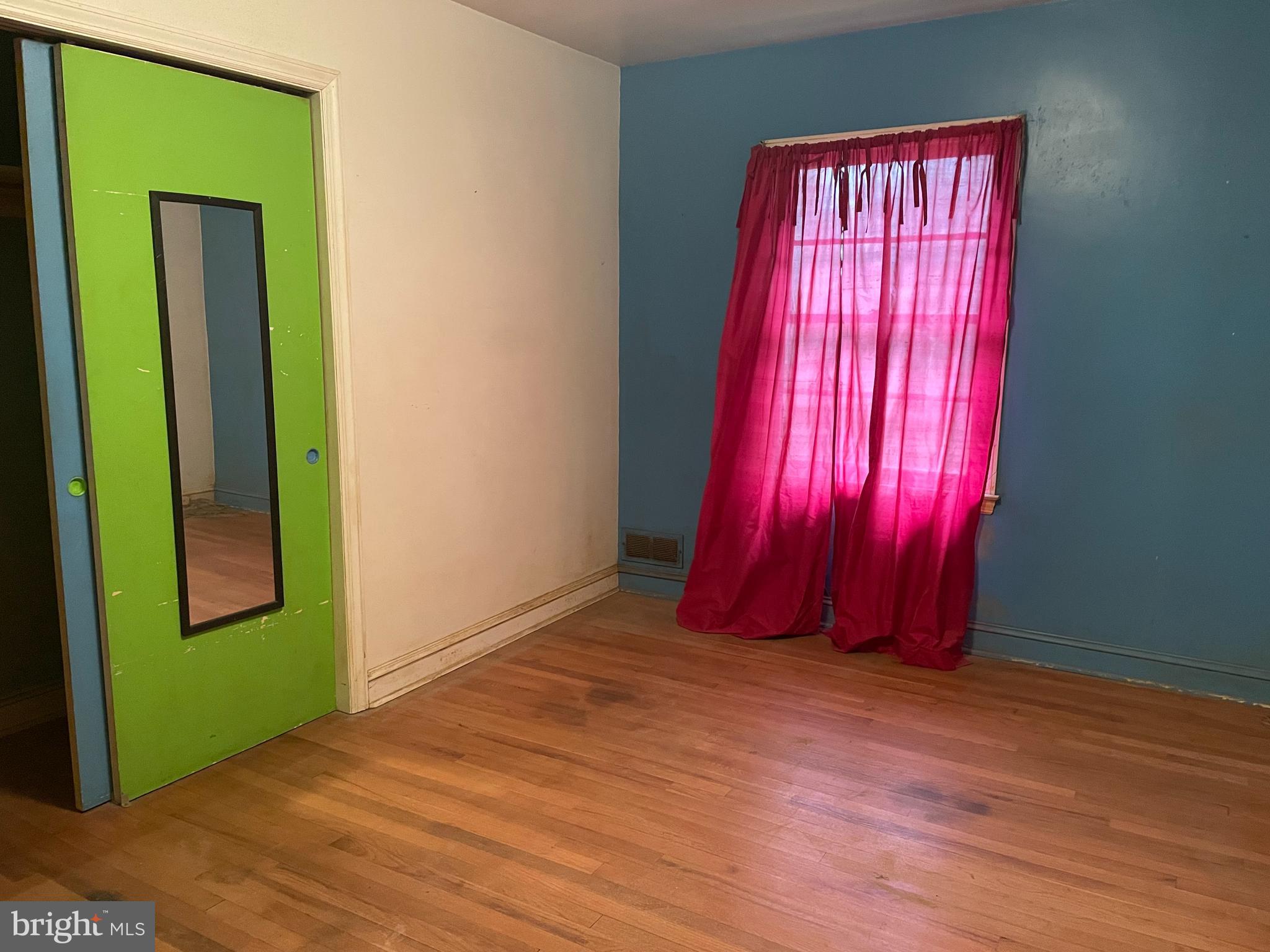 16 Brice Road Annapolis, MD 21409 - Photo 16 of 26 an empty room with wooden floor and windows
