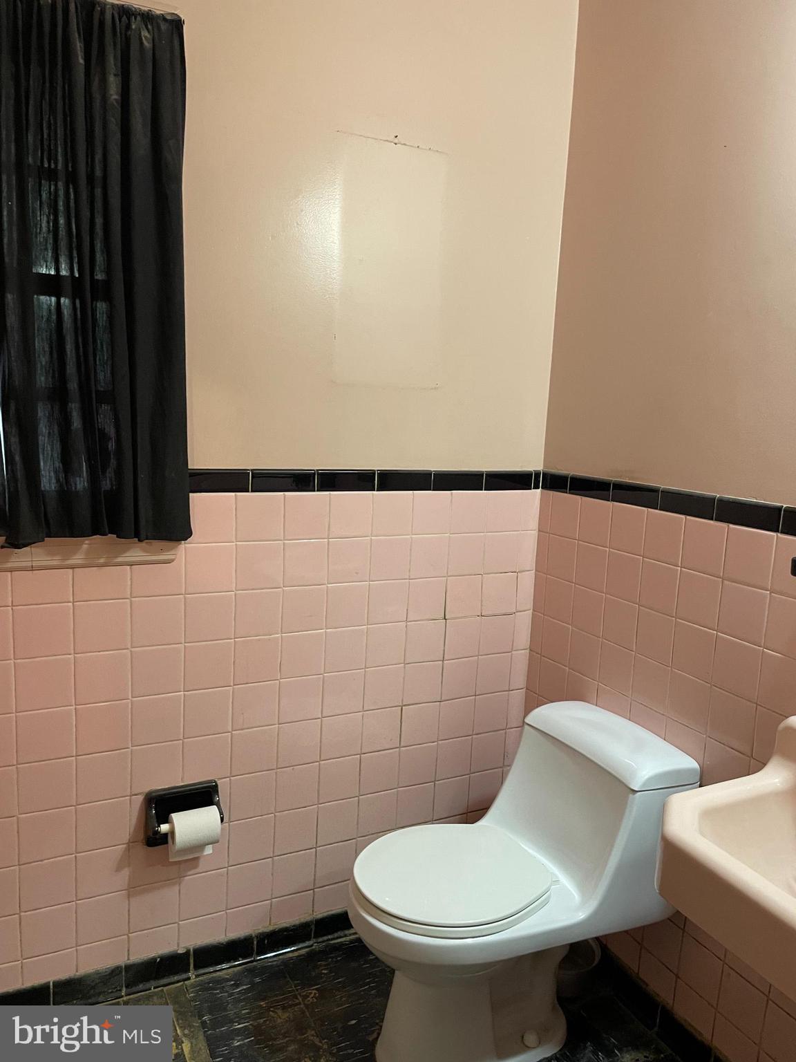 16 Brice Road Annapolis, MD 21409 - Photo 19 of 26 a bathroom with a toilet and a sink