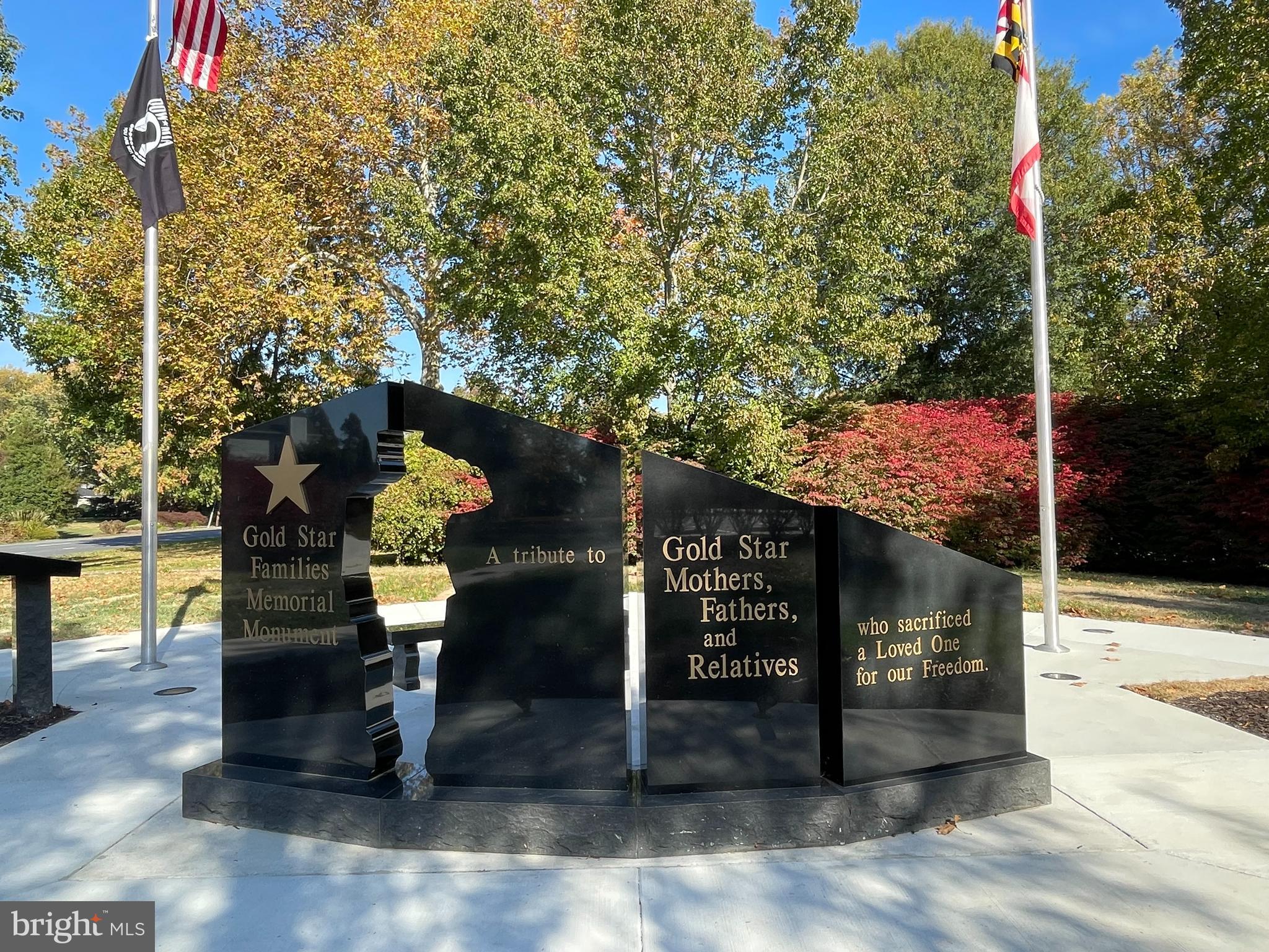 16 Brice Road Annapolis, MD 21409 - Photo 26 of 26 a street sign on a sidewalk next to a road
