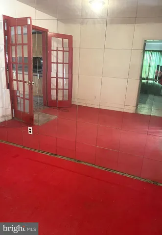 a view of empty room with windows