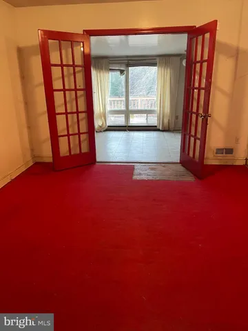 an empty room with windows