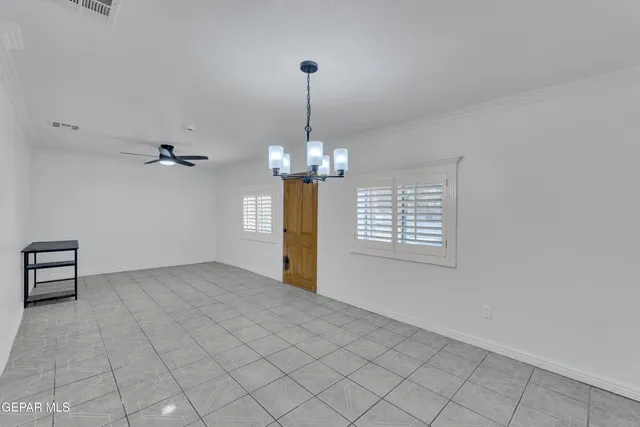 a view of a chandelier in a room