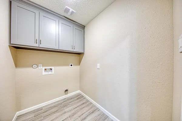 a view of room with washer and dryer