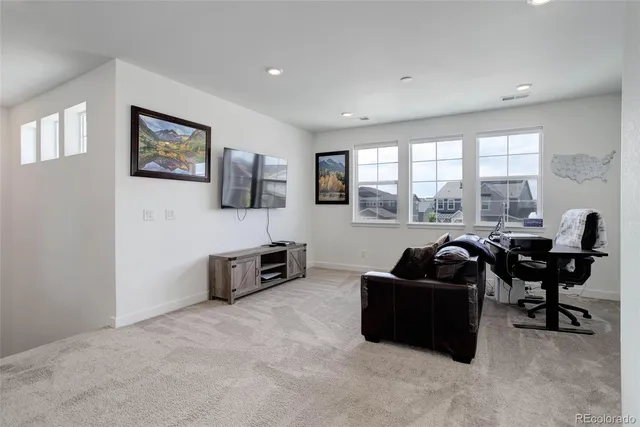 a living room with furniture and a couch