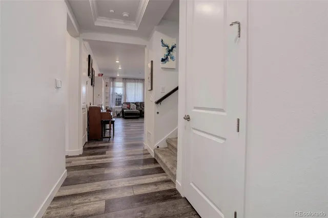 a view of entryway and hall with a hallway