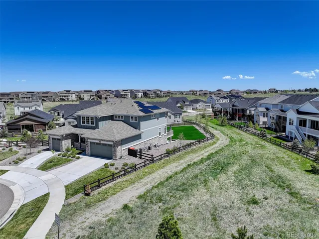 a view of a houses with a yard
