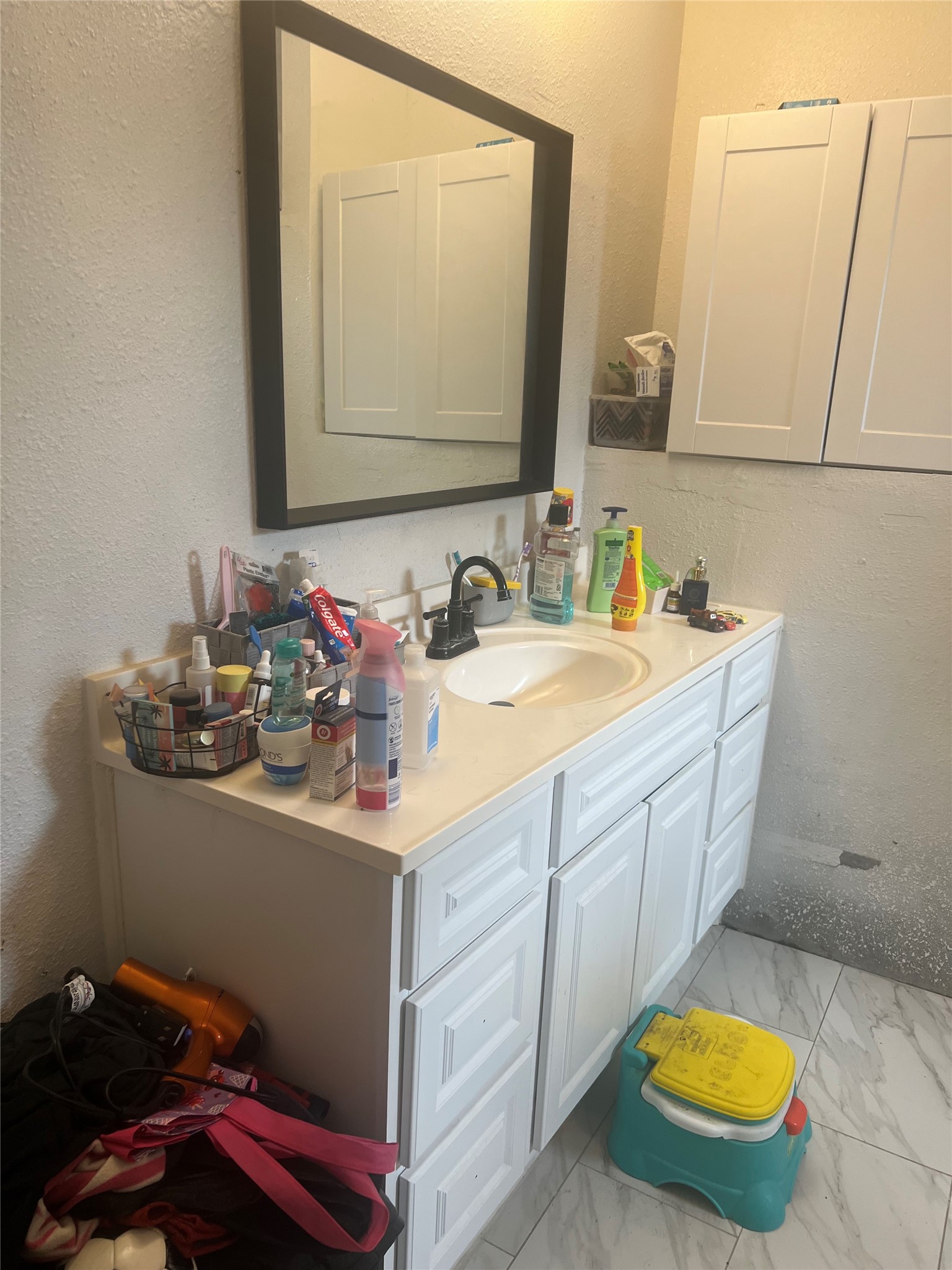 22360 East Martin Drive Porter, TX 77365 - Photo 1 of 10 a bathroom with a sink and a mirror