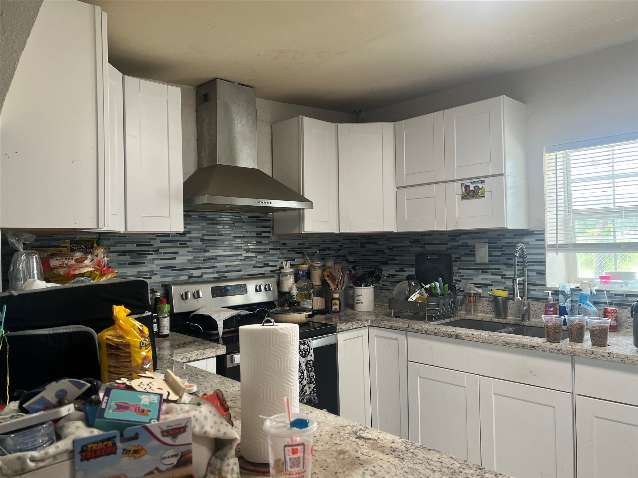 22360 East Martin Drive Porter, TX 77365 - Photo 3 of 10 a kitchen with a sink and cabinets