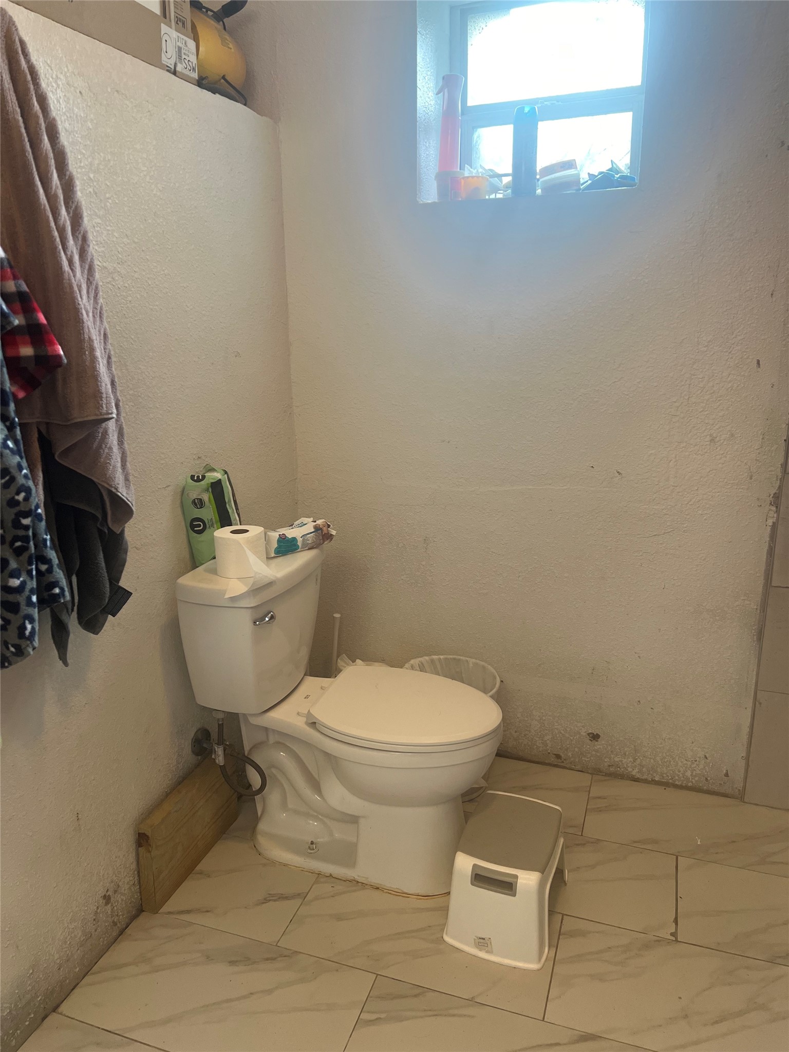 22360 East Martin Drive Porter, TX 77365 - Photo 5 of 10 a bathroom with a toilet a sink and a mirror