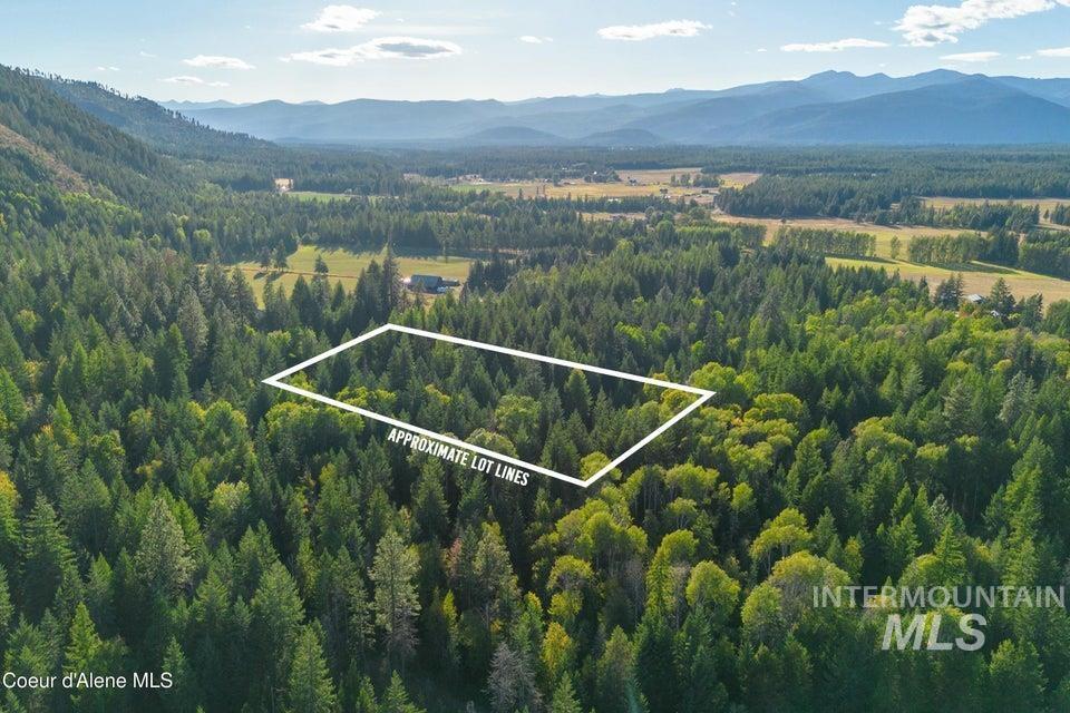 62 Reservoir Road Bonners Ferry, ID 83805 - Photo 4 of 13 Aerial view of property's location with mountains and property parcel outlined