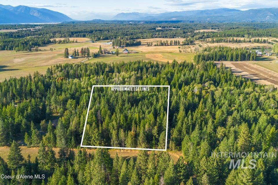 62 Reservoir Road Bonners Ferry, ID 83805 - Photo 7 of 13 Aerial view of property's location with mountains and property parcel outlined