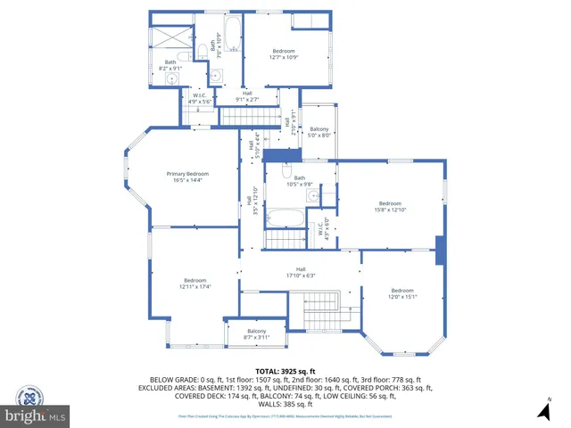 a view of a room with wooden floor and windows