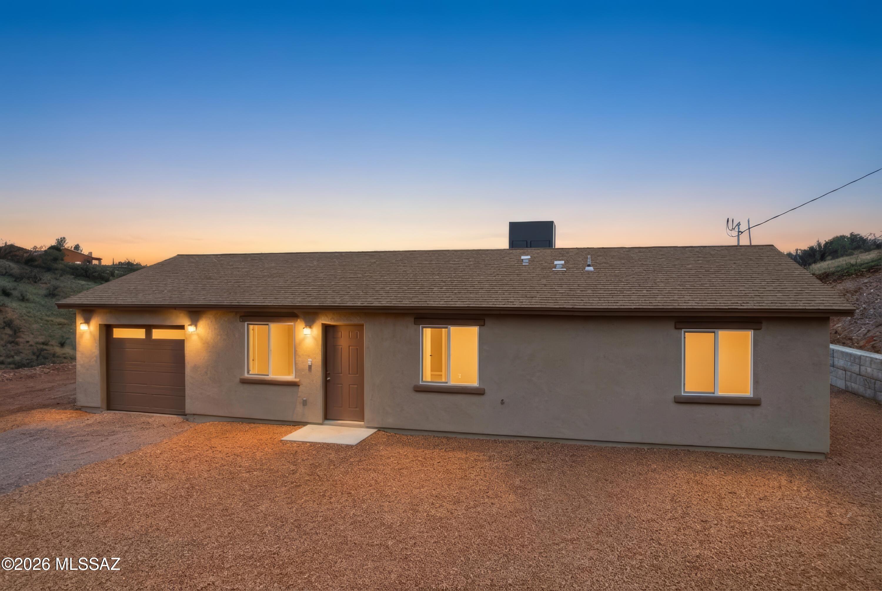 423 Rio Rico Drive Rio Rico, AZ 85648 - Photo 44 of 47 47-DJI_0082_twilight_42796ef3-4f35-4c31-
