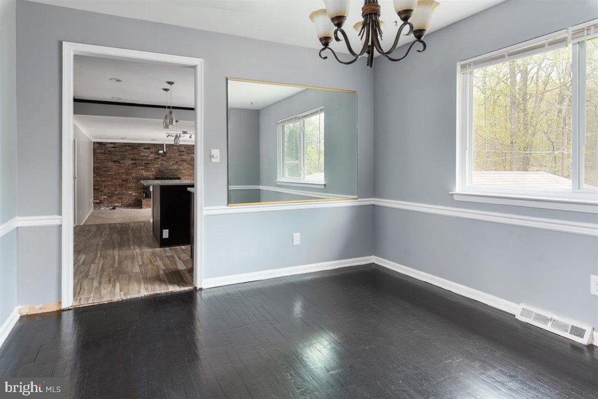 3605 Templar Road Randallstown, MD 21133 - Photo 4 of 39 Hardwood floors- Dining room overlooking back yard