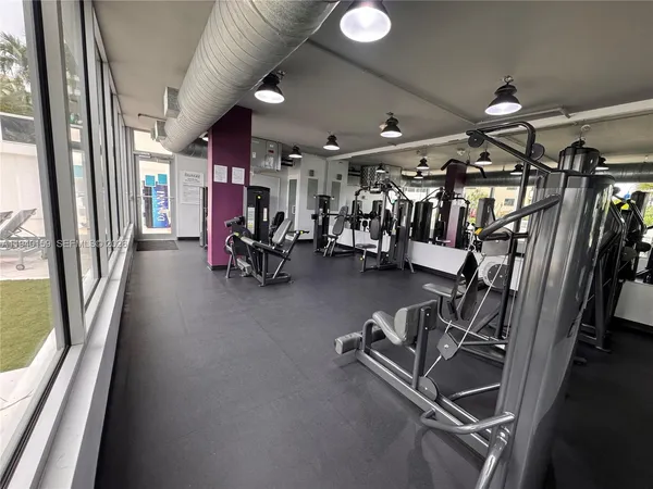 a view of a room with gym equipment