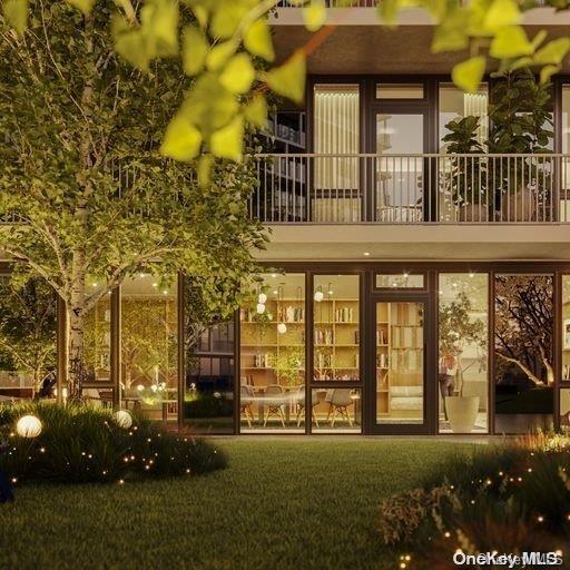 131-02 40th Road, Unit 5G Queens, NY 11354 - Photo 8 of 32 front view of a building with a garden