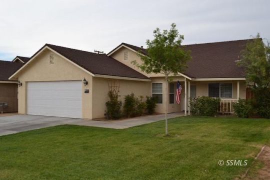 1304 South McCall Street Ridgecrest, CA 93555 - Photo 22 of 22 front view of a house with a yard
