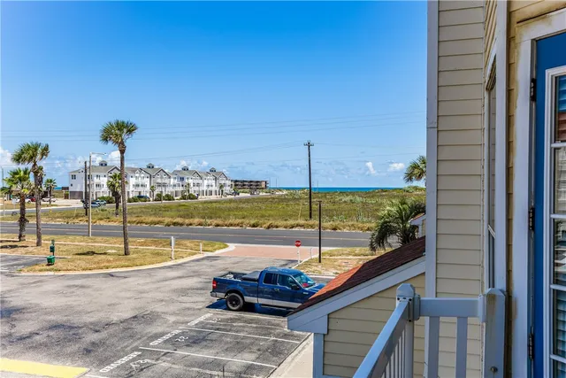 a view of a house with a street
