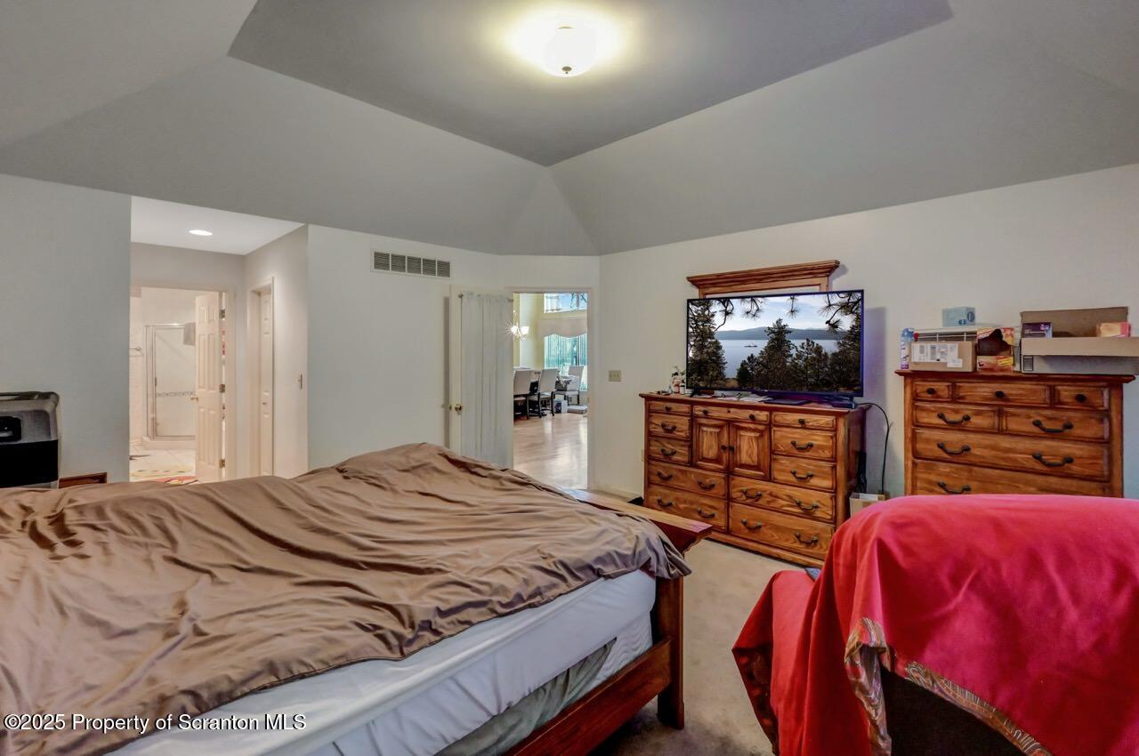 20 Hedge Row Run Clarks Summit, PA 18411 - Photo 25 of 66 a bedroom with a bed and a flat screen tv