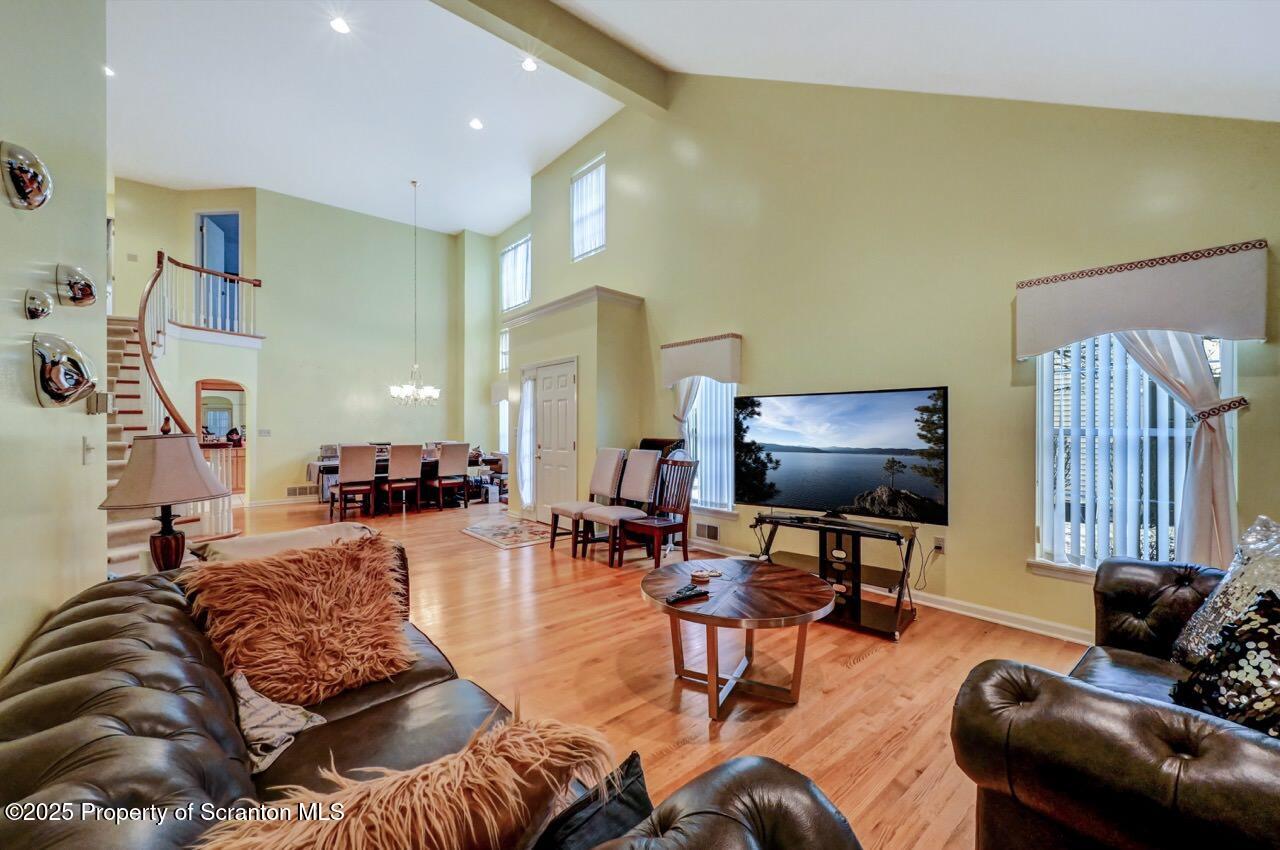 20 Hedge Row Run Clarks Summit, PA 18411 - Photo 4 of 66 a living room with furniture and a flat screen tv