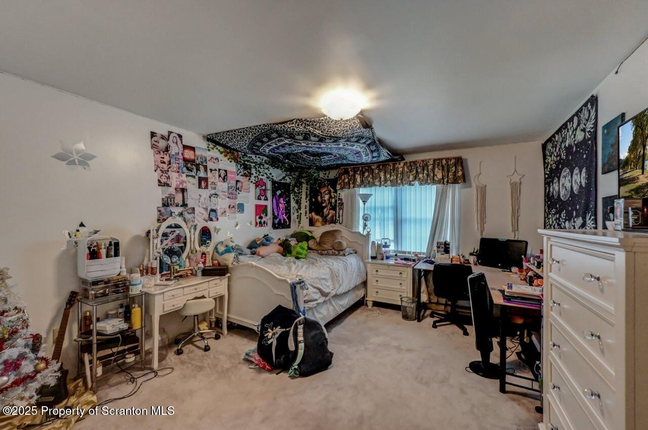 20 Hedge Row Run Clarks Summit, PA 18411 - Photo 55 of 66 a bed room with furniture and a window