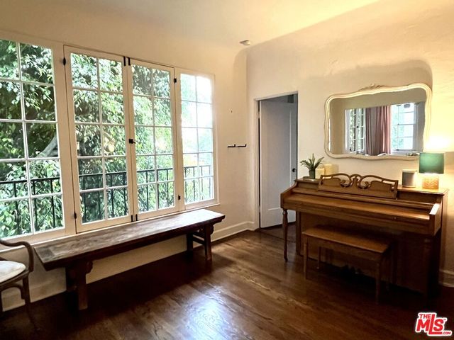 a sitting area with large window