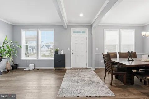 a view of a livingroom with furniture and window