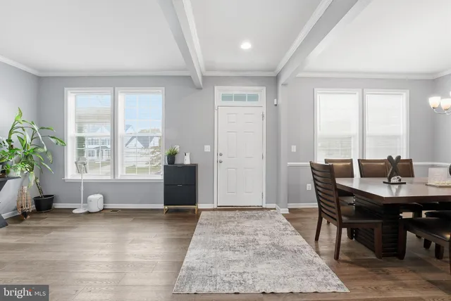 a view of a livingroom with furniture and window