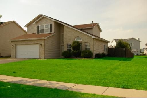 5907 Alpine Way Plainfield, IL 60586 - Photo 1 of 1 a view of a back yard of the house