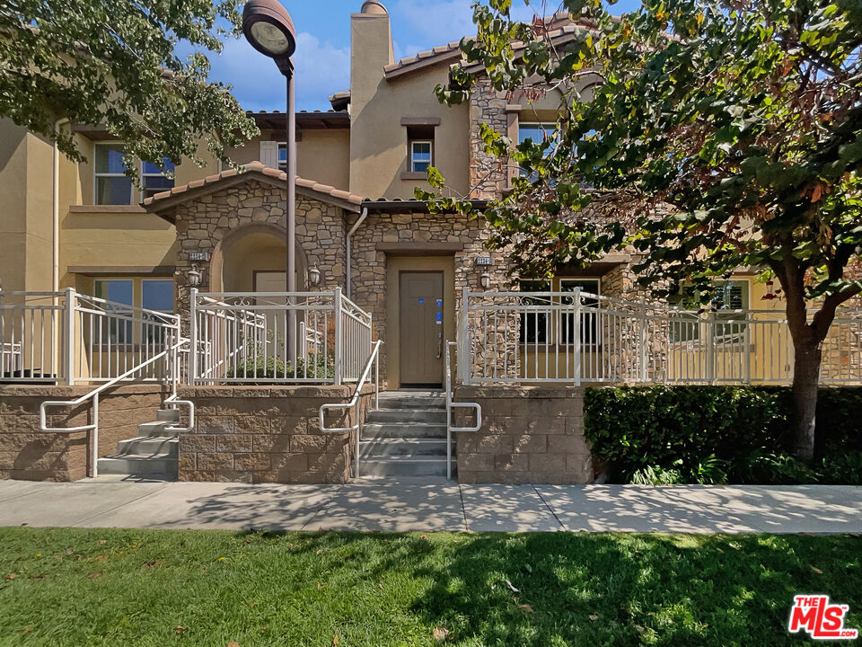 2234 Winifred Street, Unit 3 Simi Valley, CA 93063 - Photo 1 of 21 front view of a house with a yard