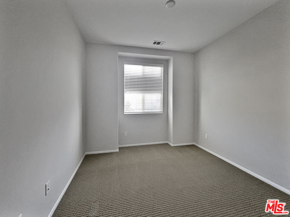 2234 Winifred Street, Unit 3 Simi Valley, CA 93063 - Photo 16 of 21 a view of an empty room with a window