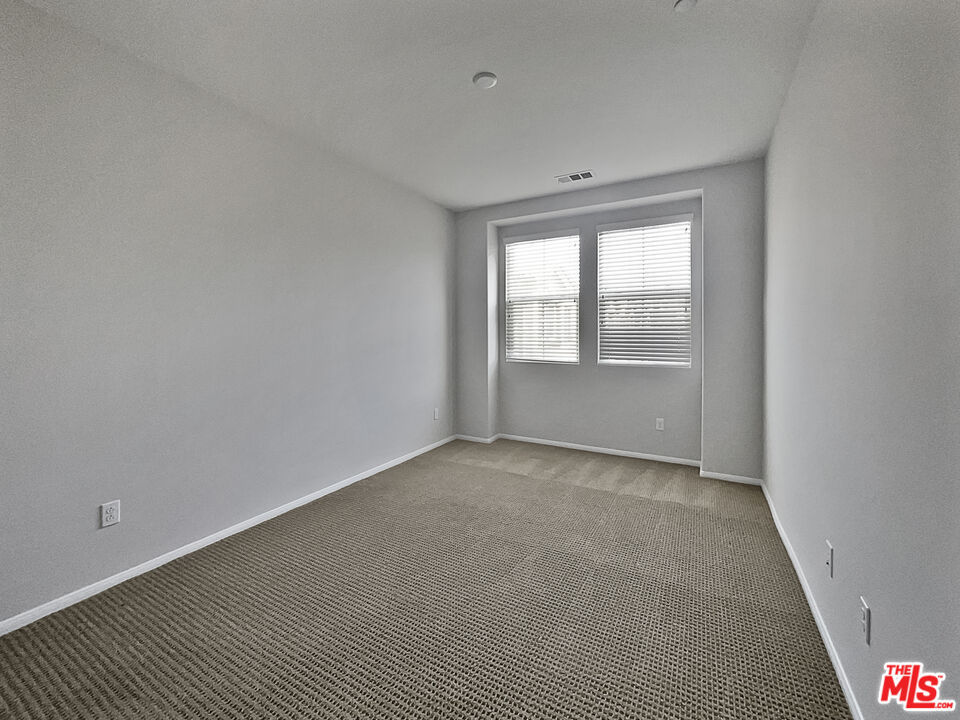 2234 Winifred Street, Unit 3 Simi Valley, CA 93063 - Photo 17 of 21 an empty room with windows