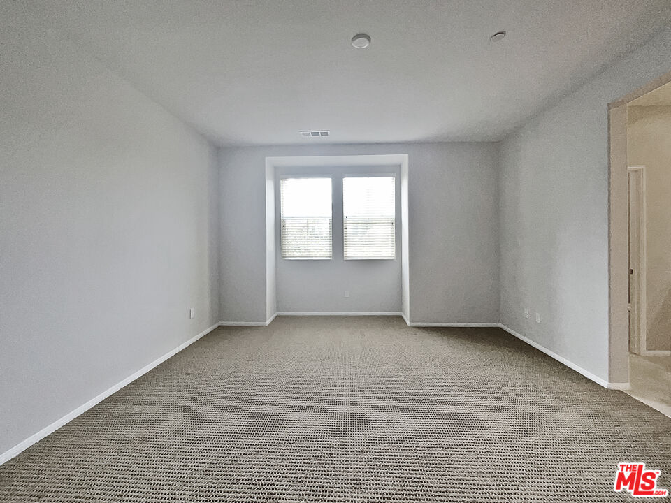 2234 Winifred Street, Unit 3 Simi Valley, CA 93063 - Photo 3 of 21 a view of an empty room with a window