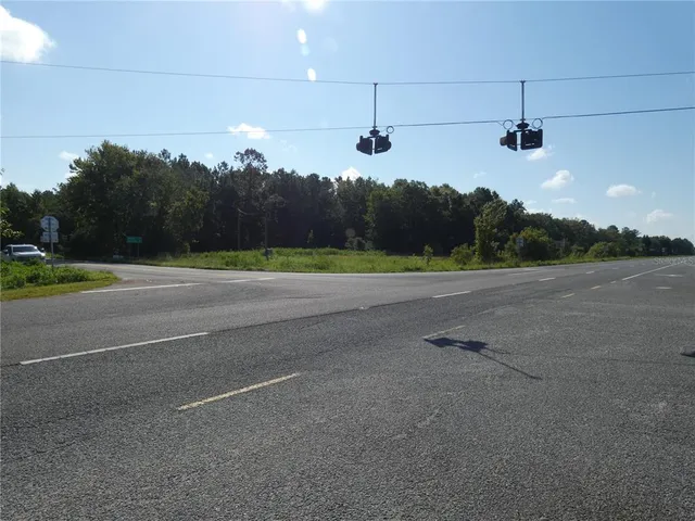 a view of a road with a yard