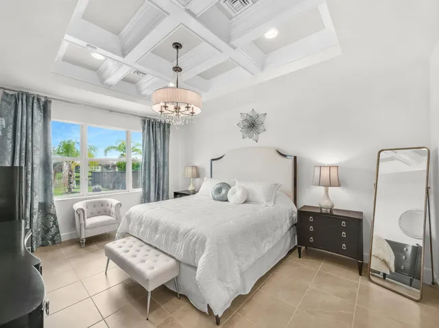 a living room with lots of furniture and a clock