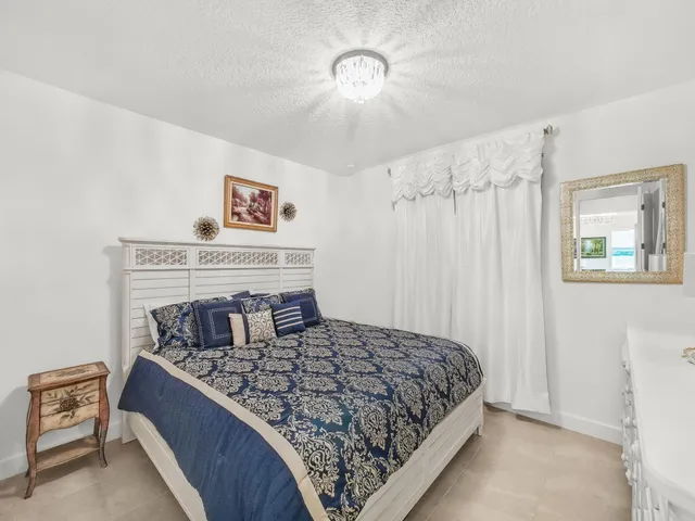 a living room with lots of furniture and a view of living room