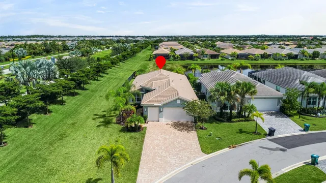 a very nice looking dining room with a table and chairs