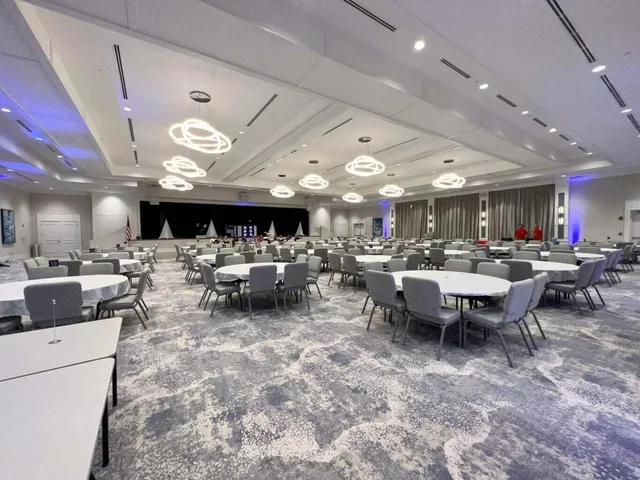 an aerial view of a houses with ocean view